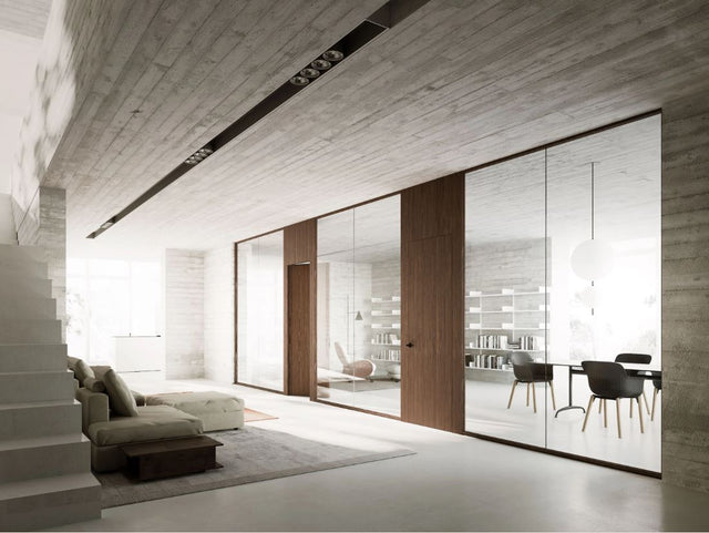 Modern interior design with a staircase, living room, and dining area.