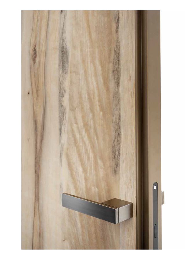 Wooden door with a metallic handle and lock mechanism